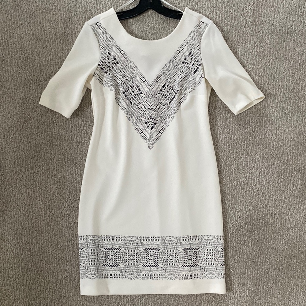 1. state white dress with black detail